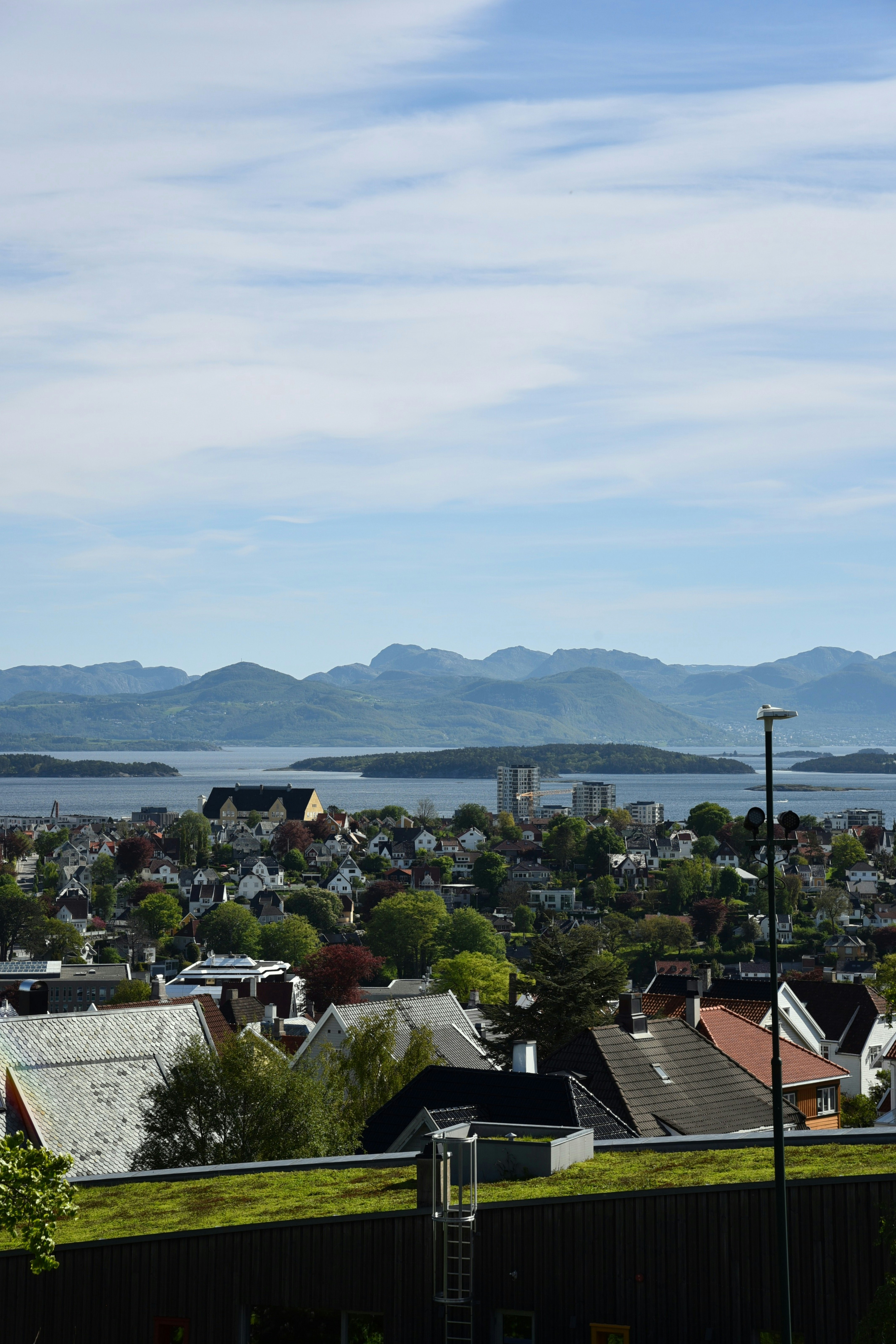 A view of a city with mountains in the background