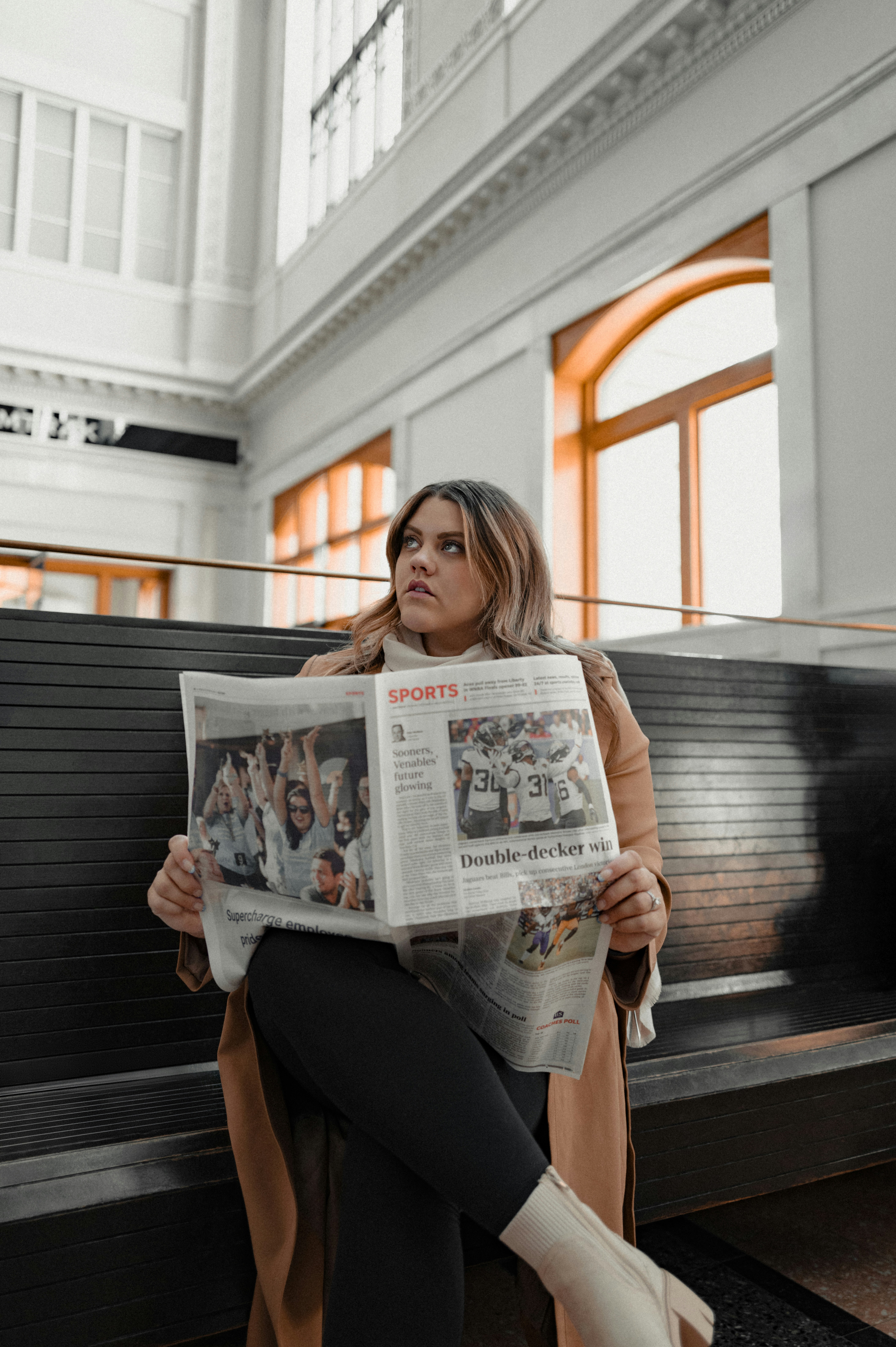 woman wearing yellow long-sleeved dress under white clouds and blue sky during daytime