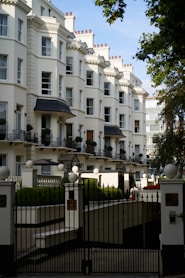 A large white building with many balconies
