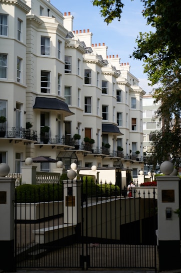 A large white building with many balconies
