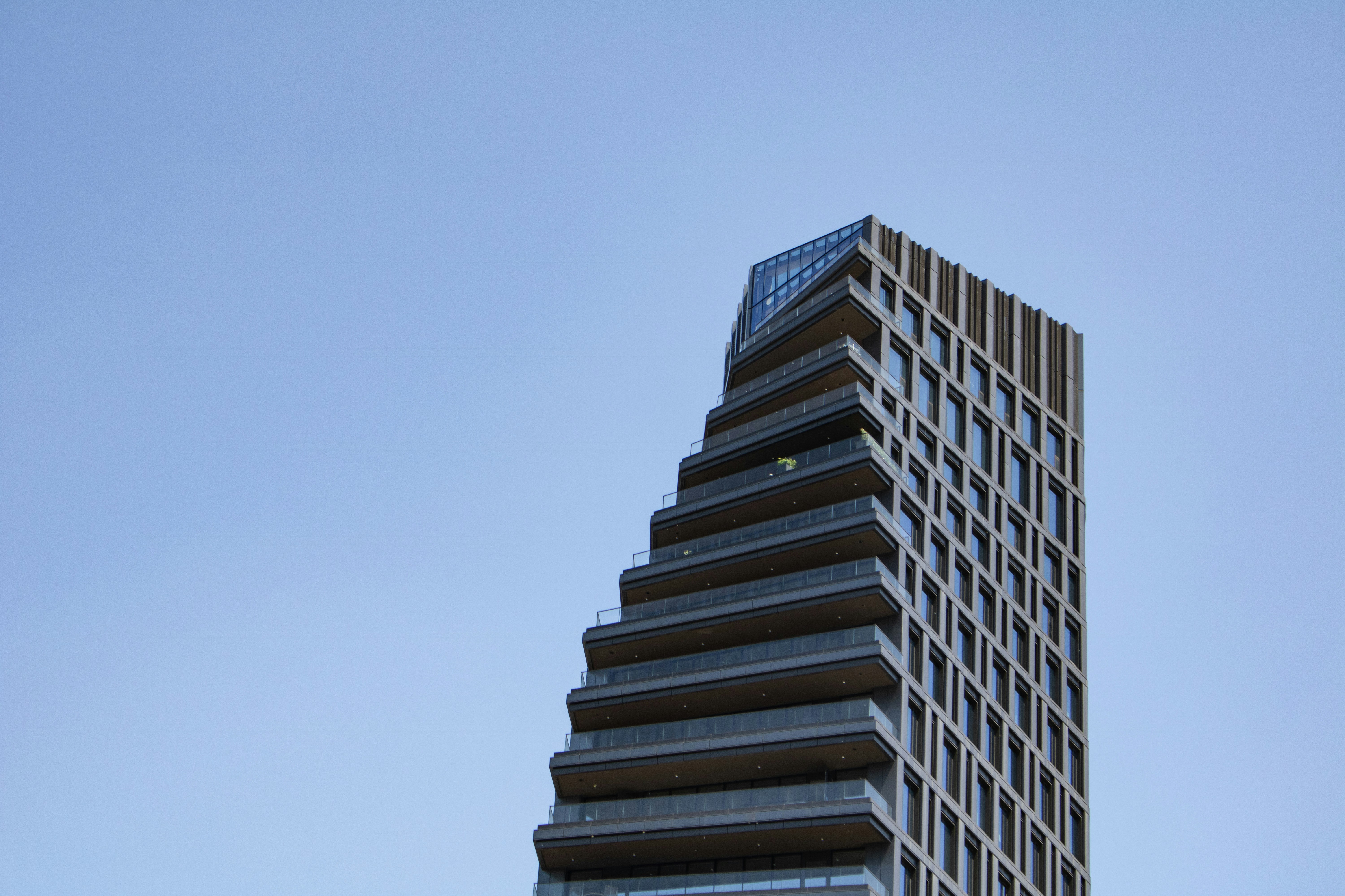 A tall building with a sky background