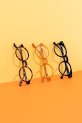 Three pairs of glasses sitting next to each other