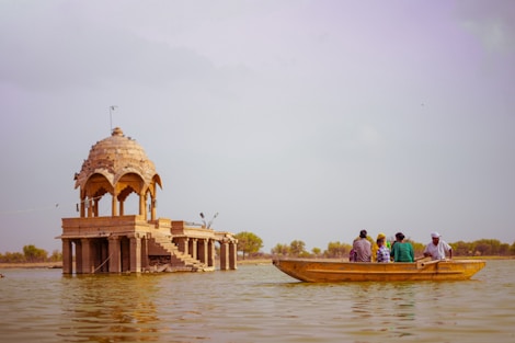 A group of people on a boat in the water