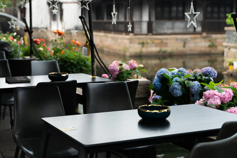 Restaurant tables, chairs and umbrellas