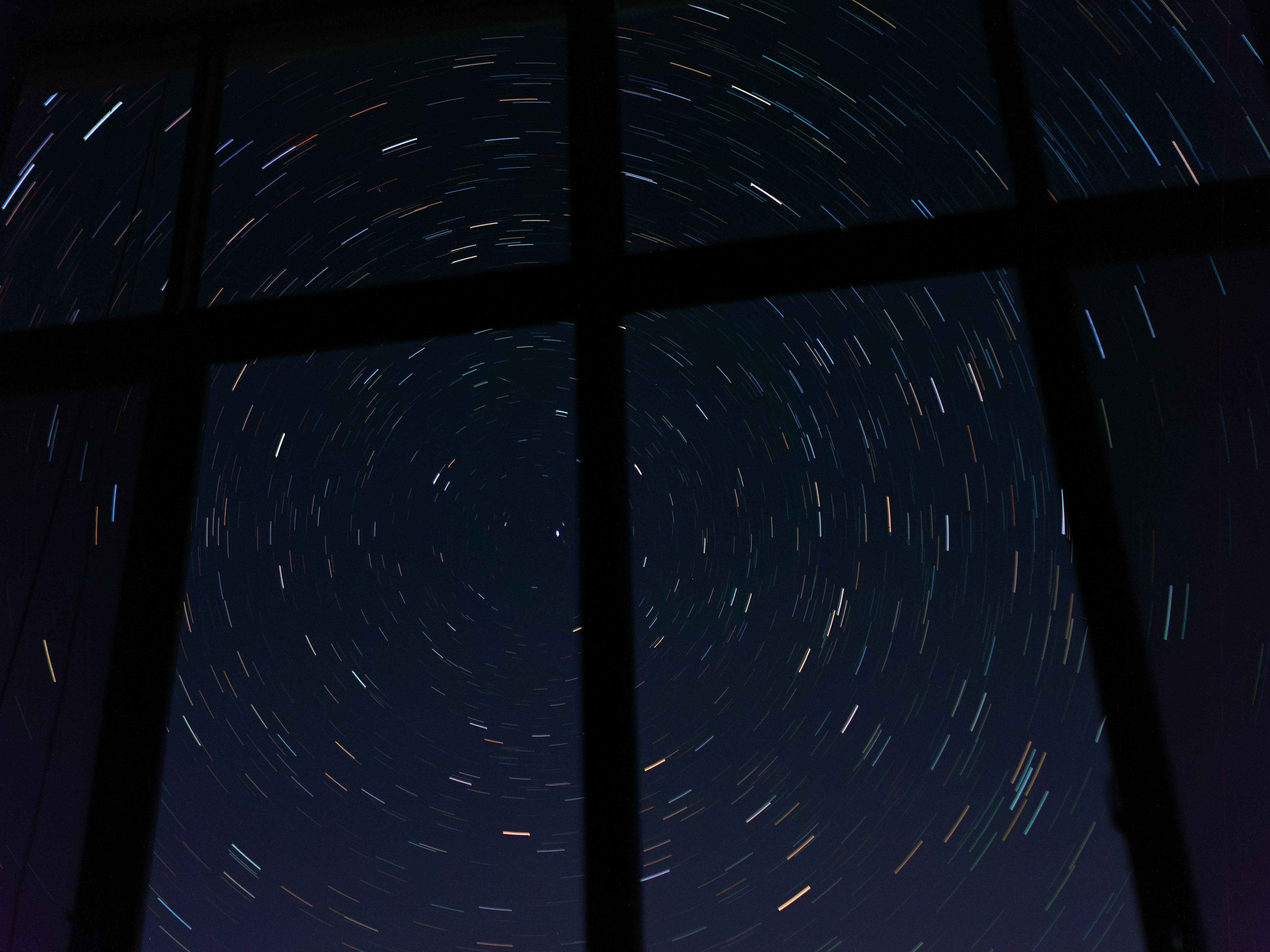 A window with a view of the night sky