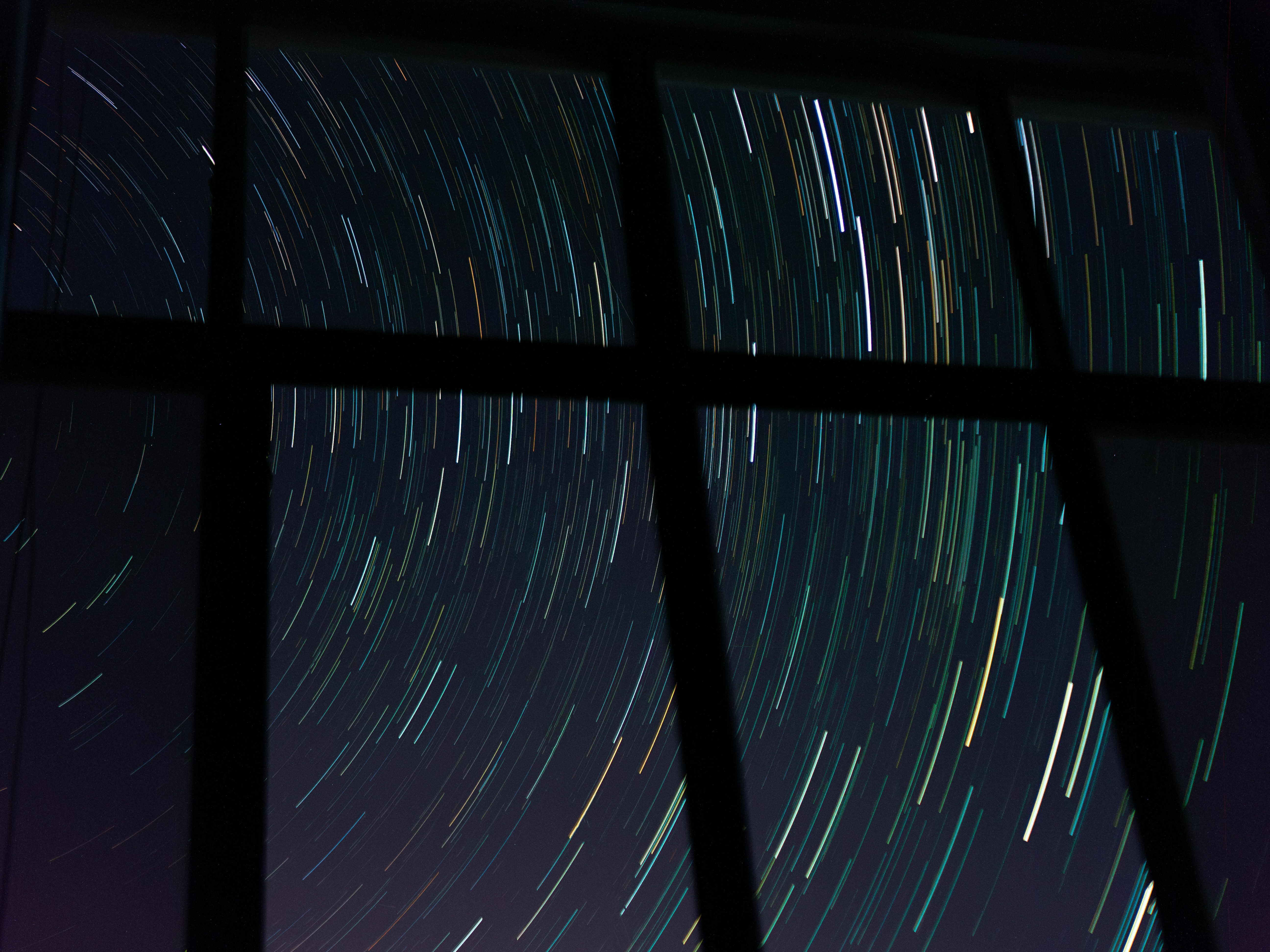 A window with a view of the night sky
