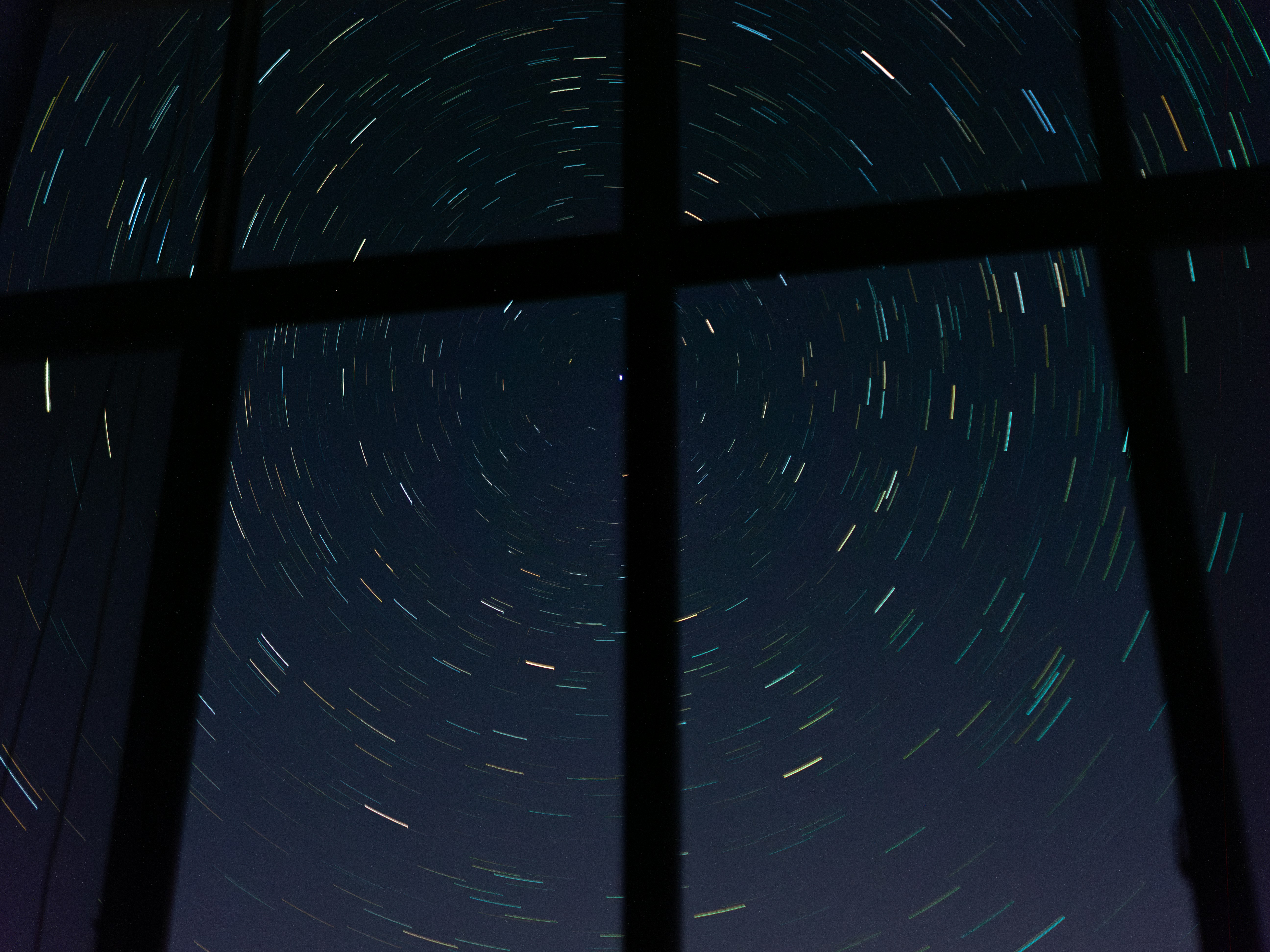 A window with a view of the night sky