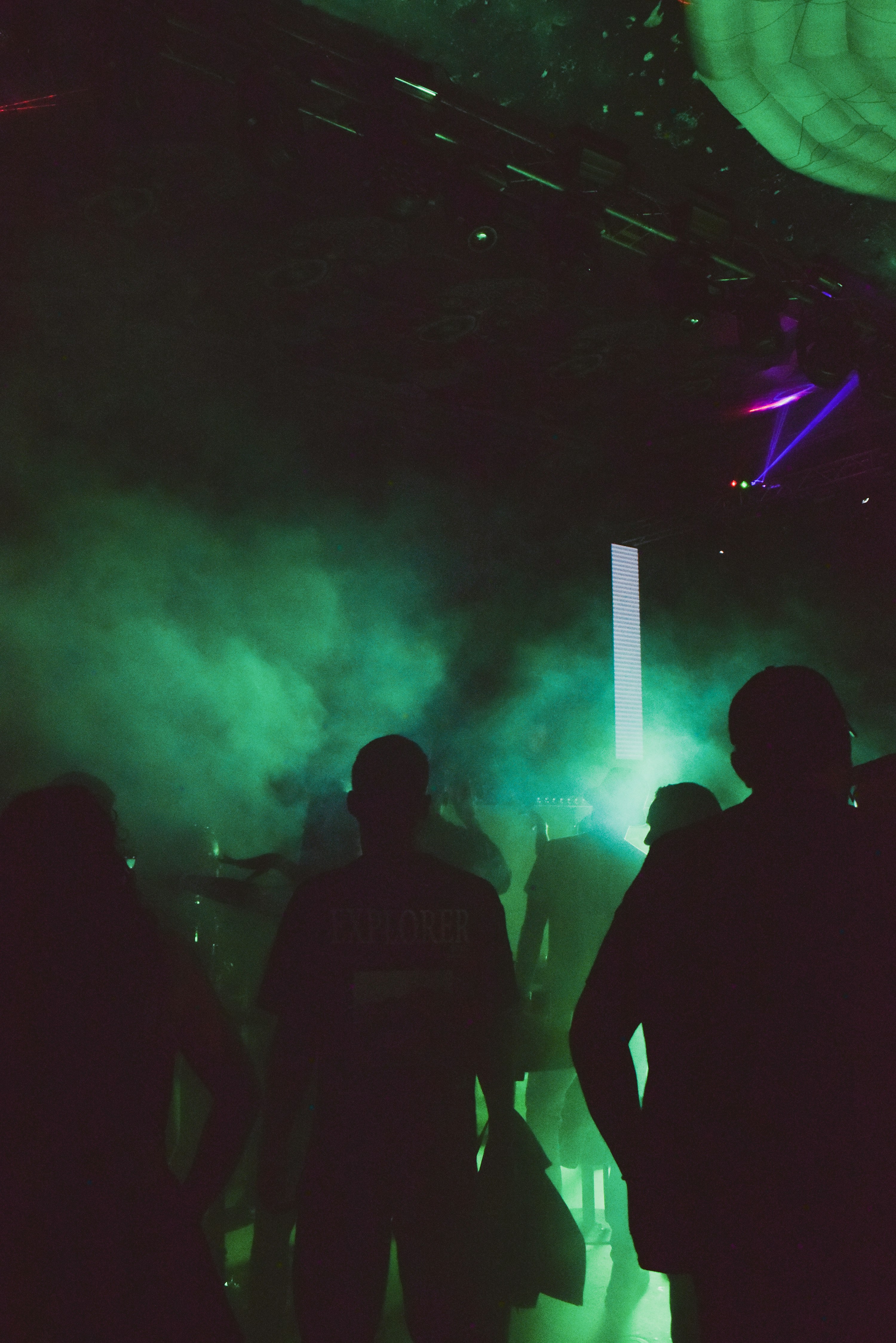 A group of people standing on top of a stage
