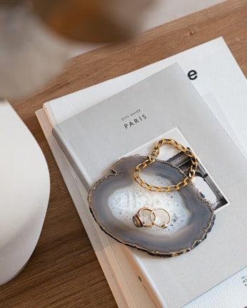 A couple of rings sitting on top of a book