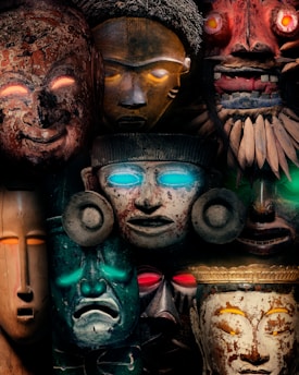 A group of masks sitting next to each other
