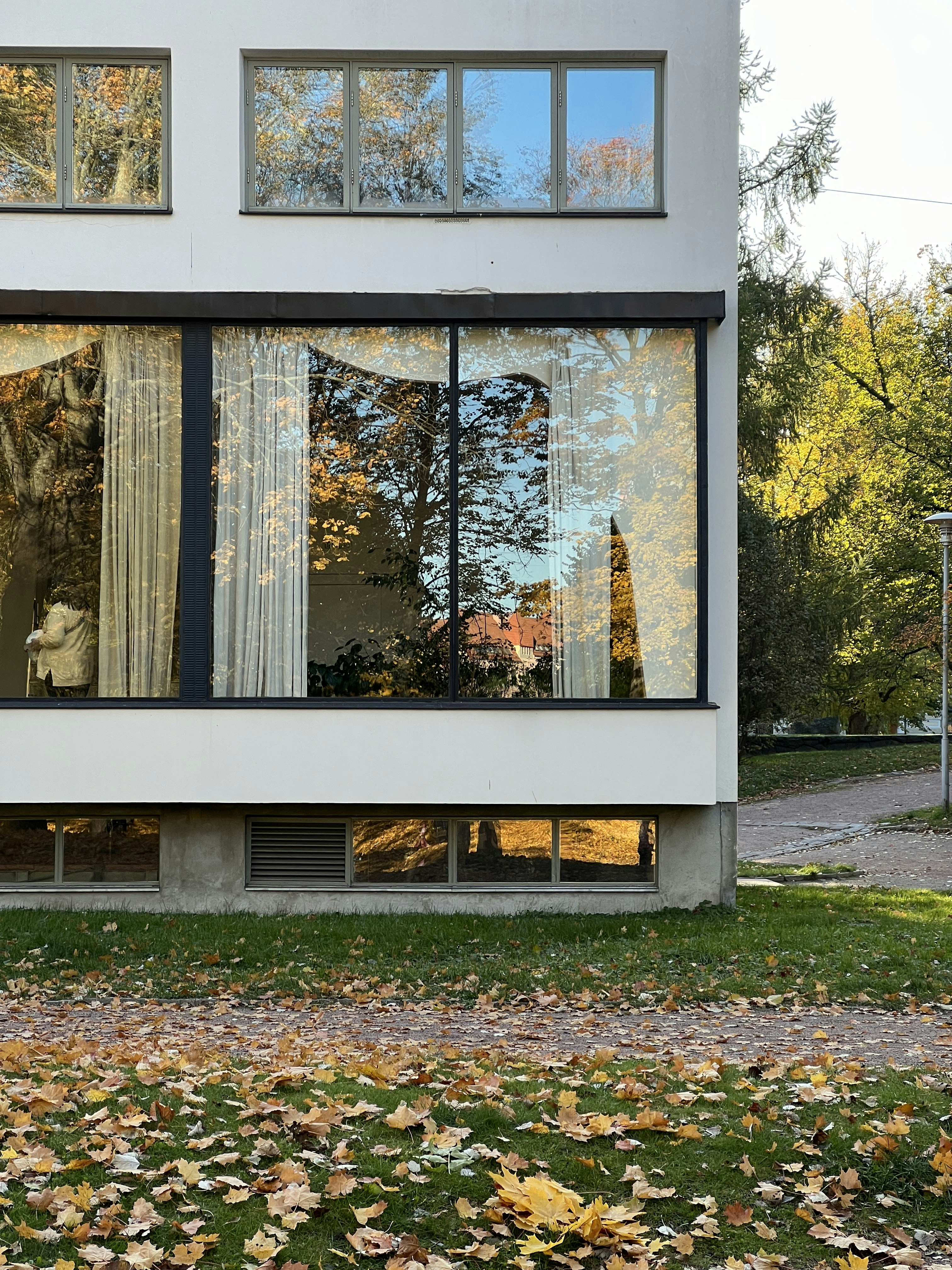 A white house with a large glass window