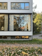 A white house with a large glass window