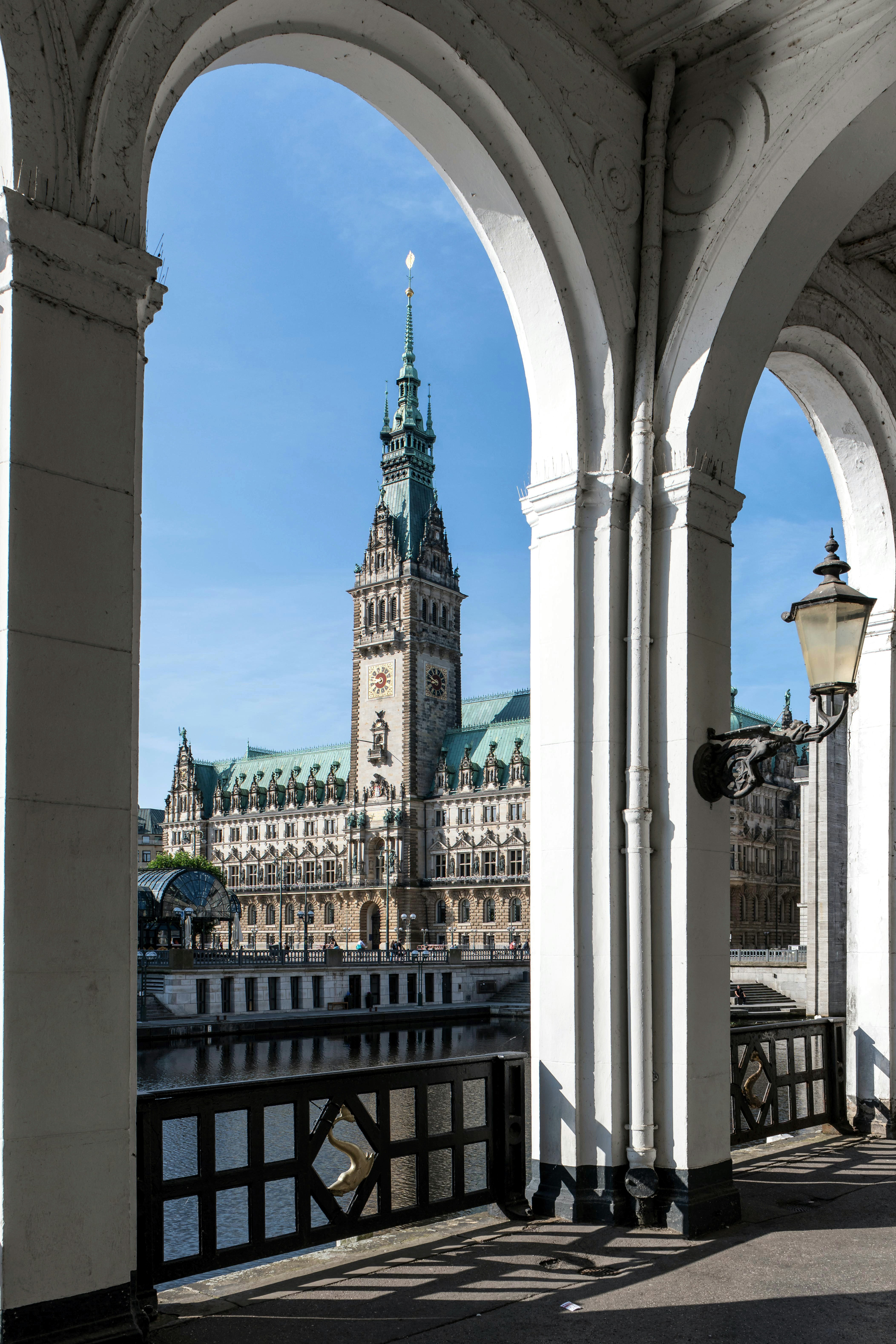 A large building with a clock tower in the background