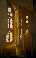 A church with stained glass windows and stairs