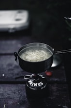 A pot of food sitting on top of a stove