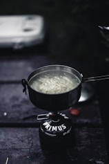 A pot of food sitting on top of a stove