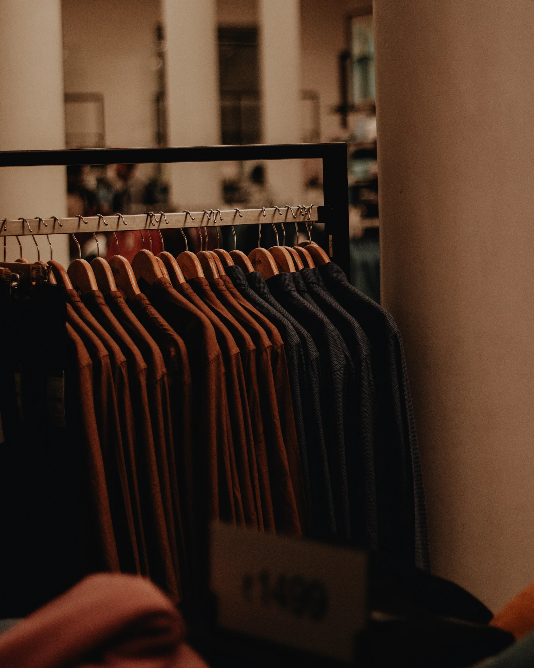 A rack of shirts in a clothing store