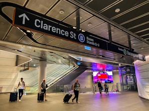 A group of people walking through an airport