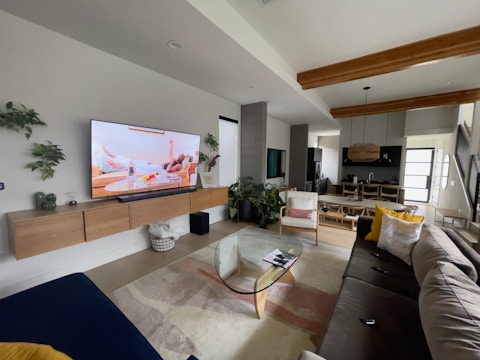 A living room filled with furniture and a flat screen TV