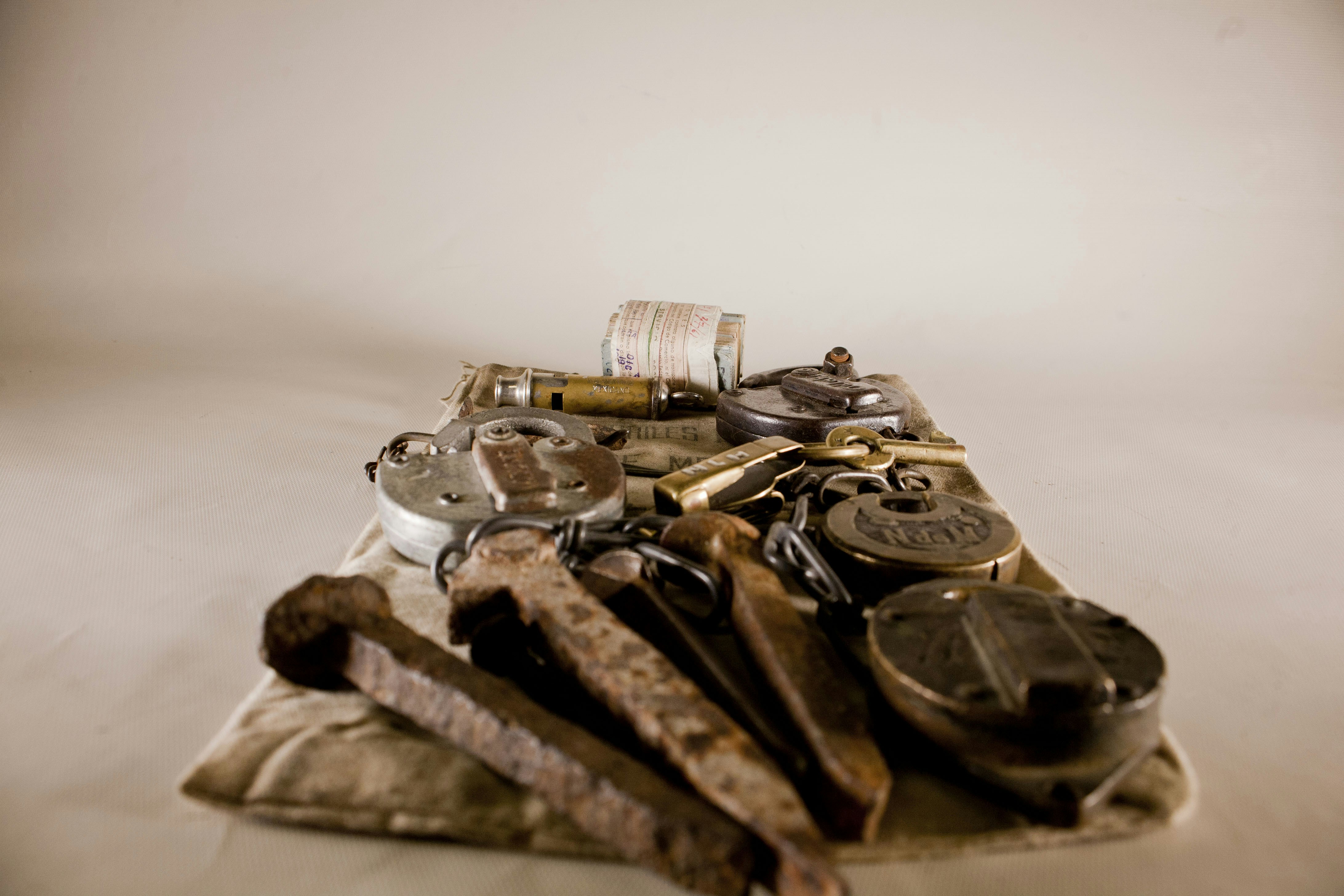 A pile of junk sitting on top of a bed