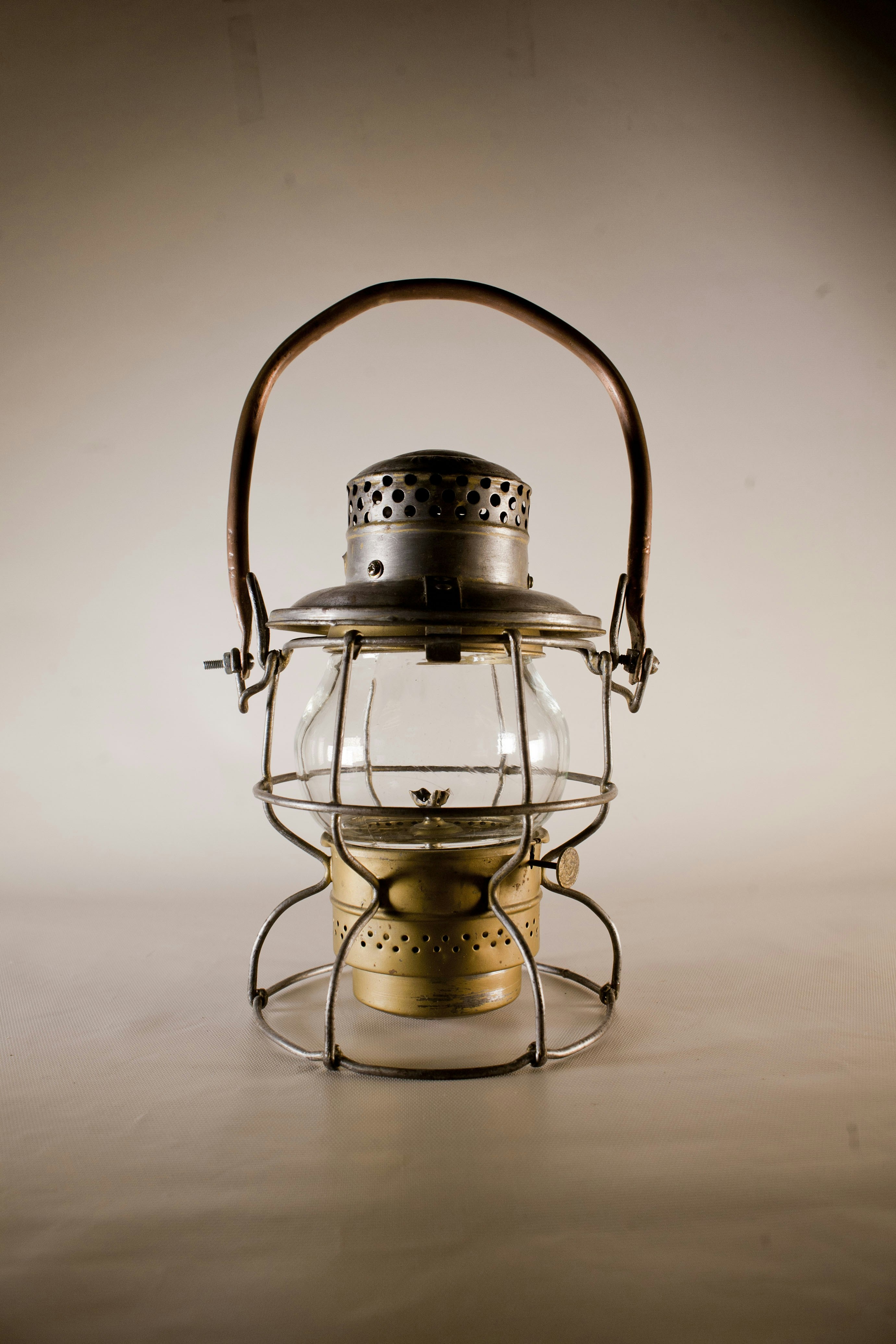 A small lantern with a light inside of it