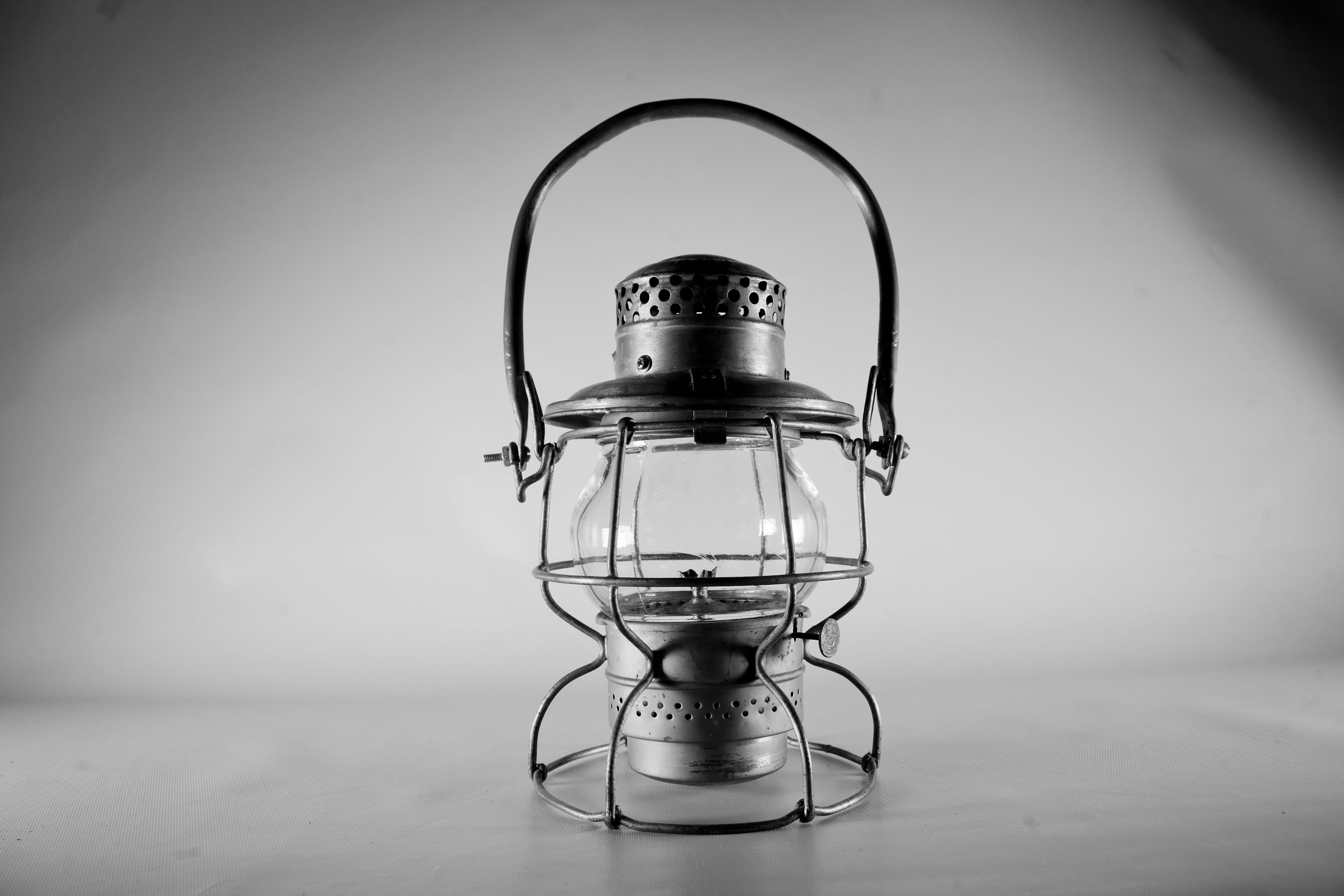 A black and white photo of a lantern