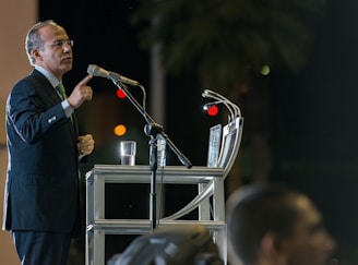 A man standing at a podium giving a speech