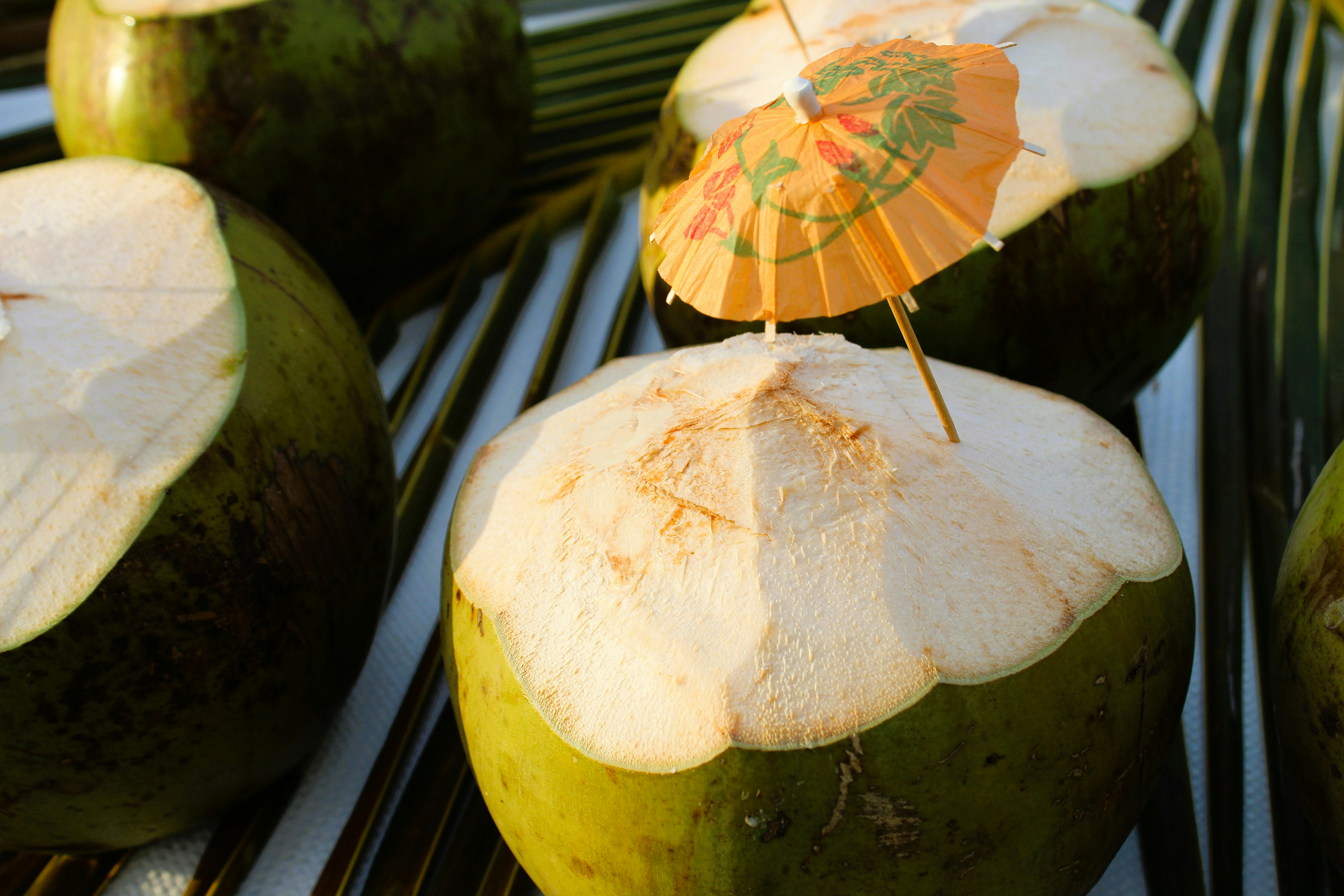 A close up of a bunch of fruit with an umbrella