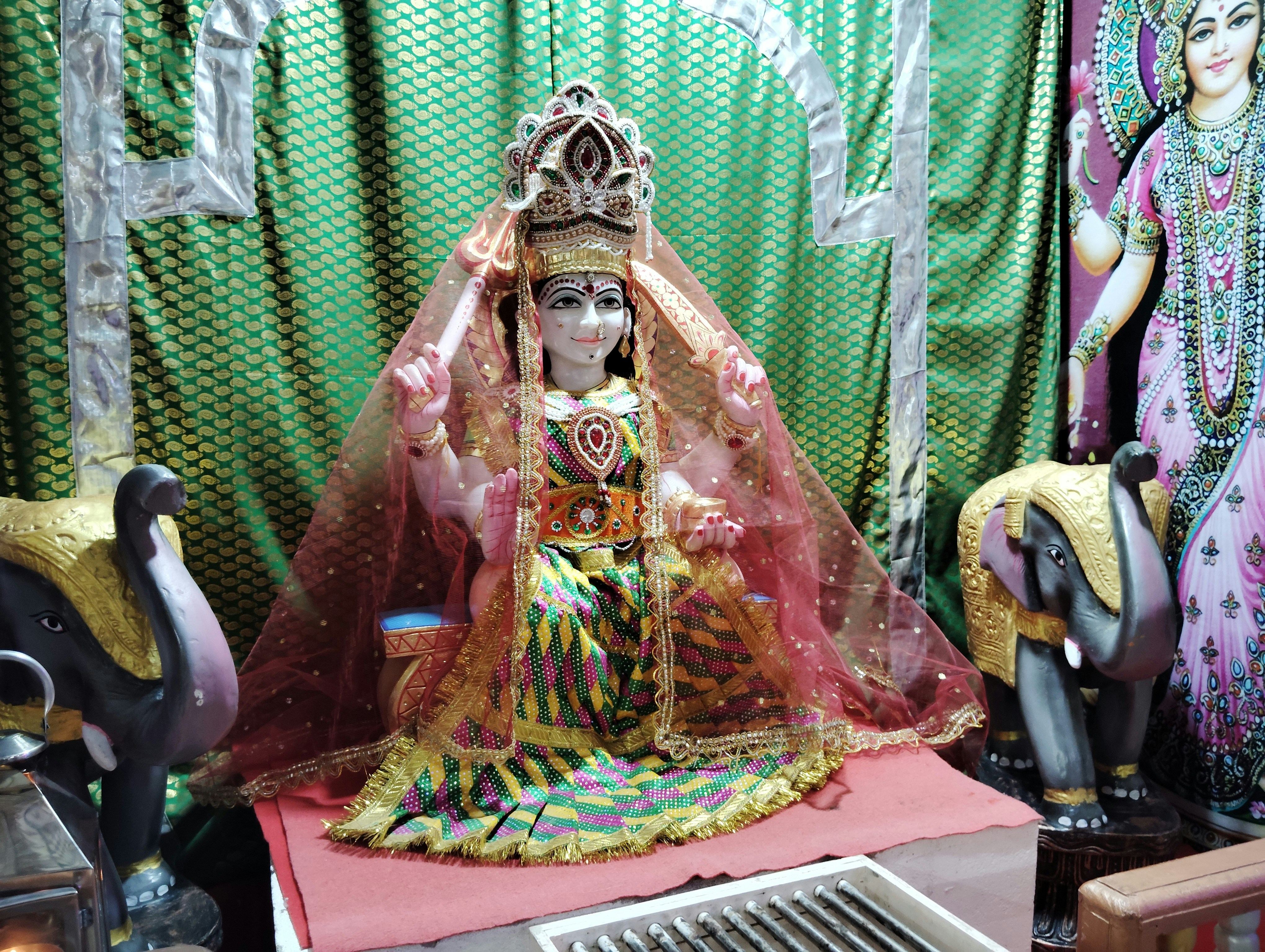 There is a statue of a woman in a room