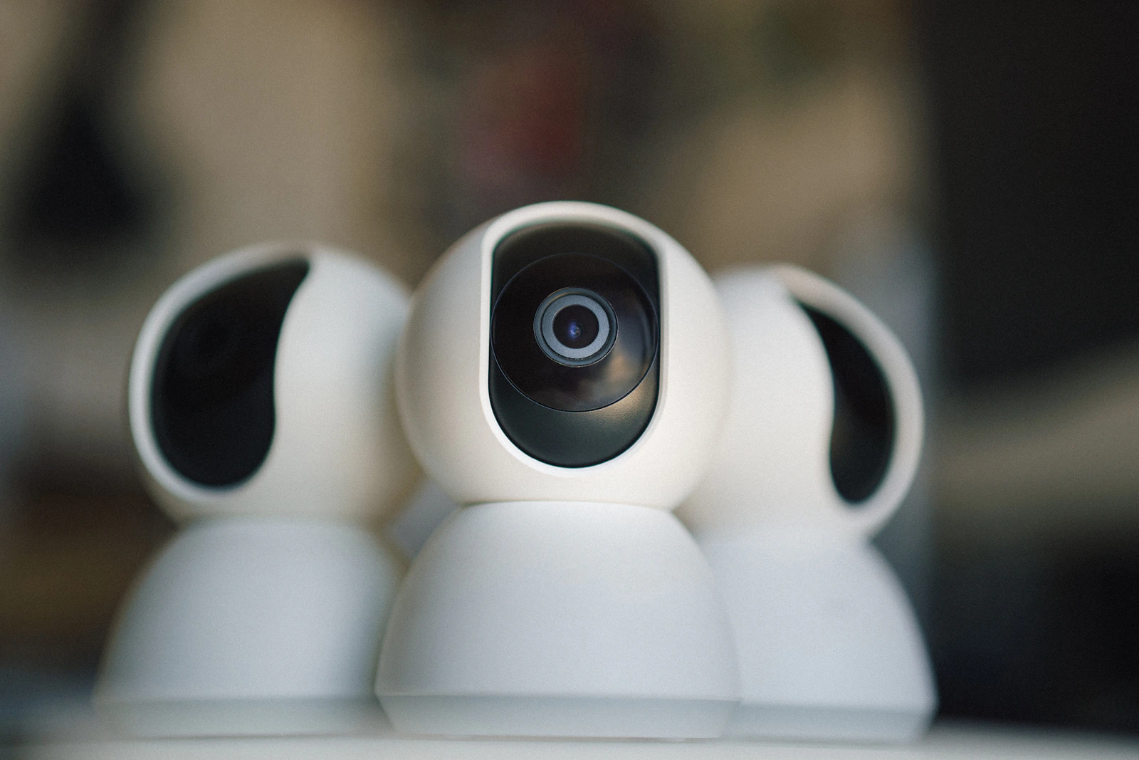 Compact indoor smart home security camera on a table