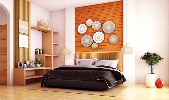 A bedroom with a bed, shelves and a plant