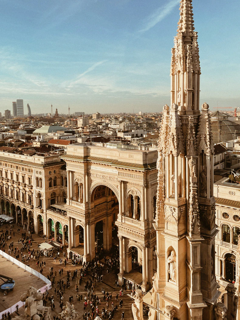 An aerial view of a large building with a clock tower