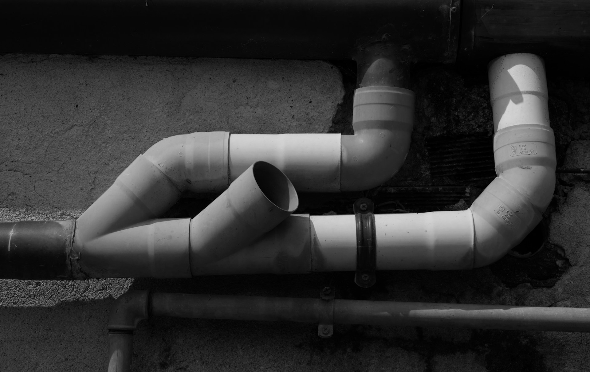A black and white photo of a pipe