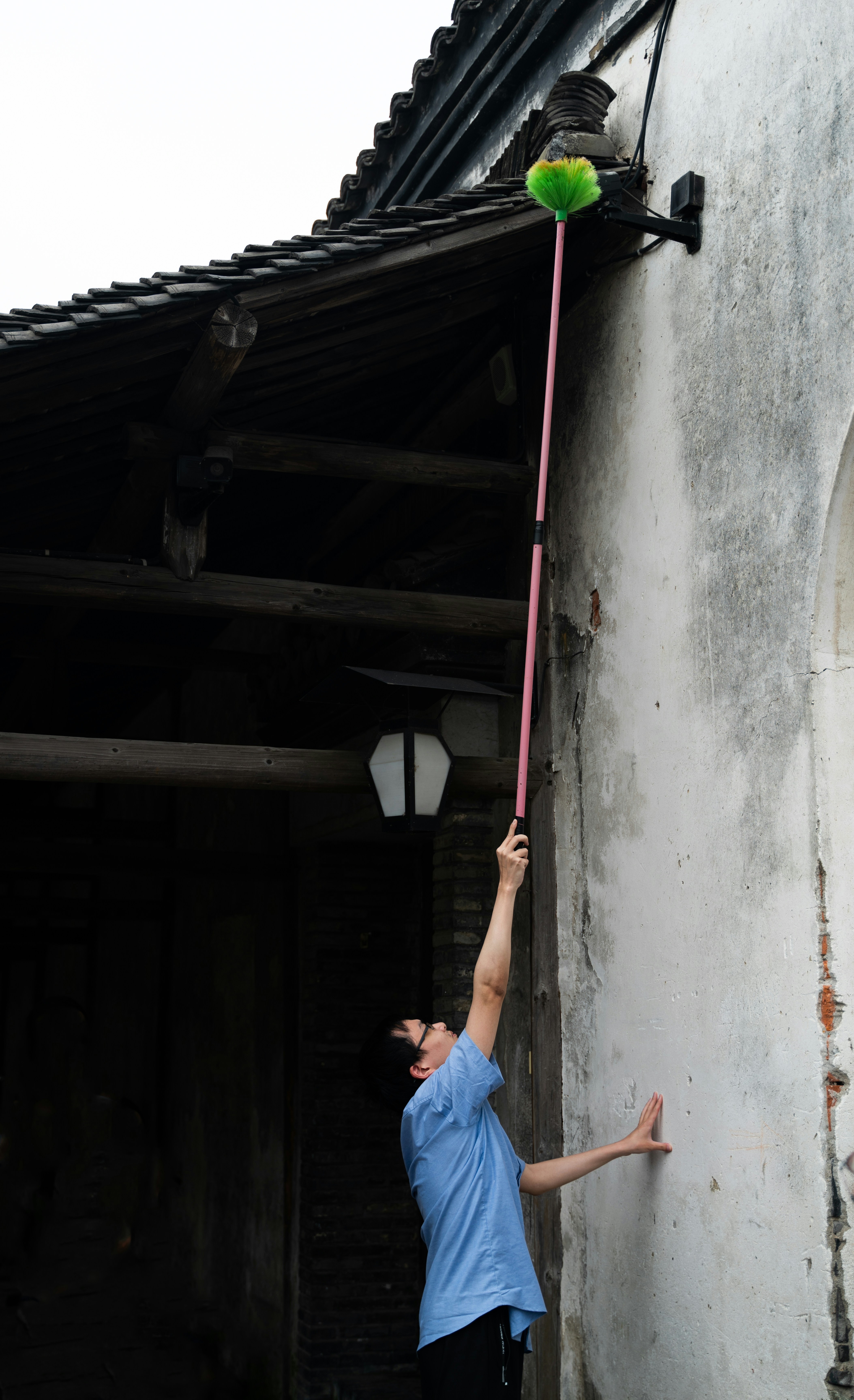 woman wearing yellow long-sleeved dress under white clouds and blue sky during daytime