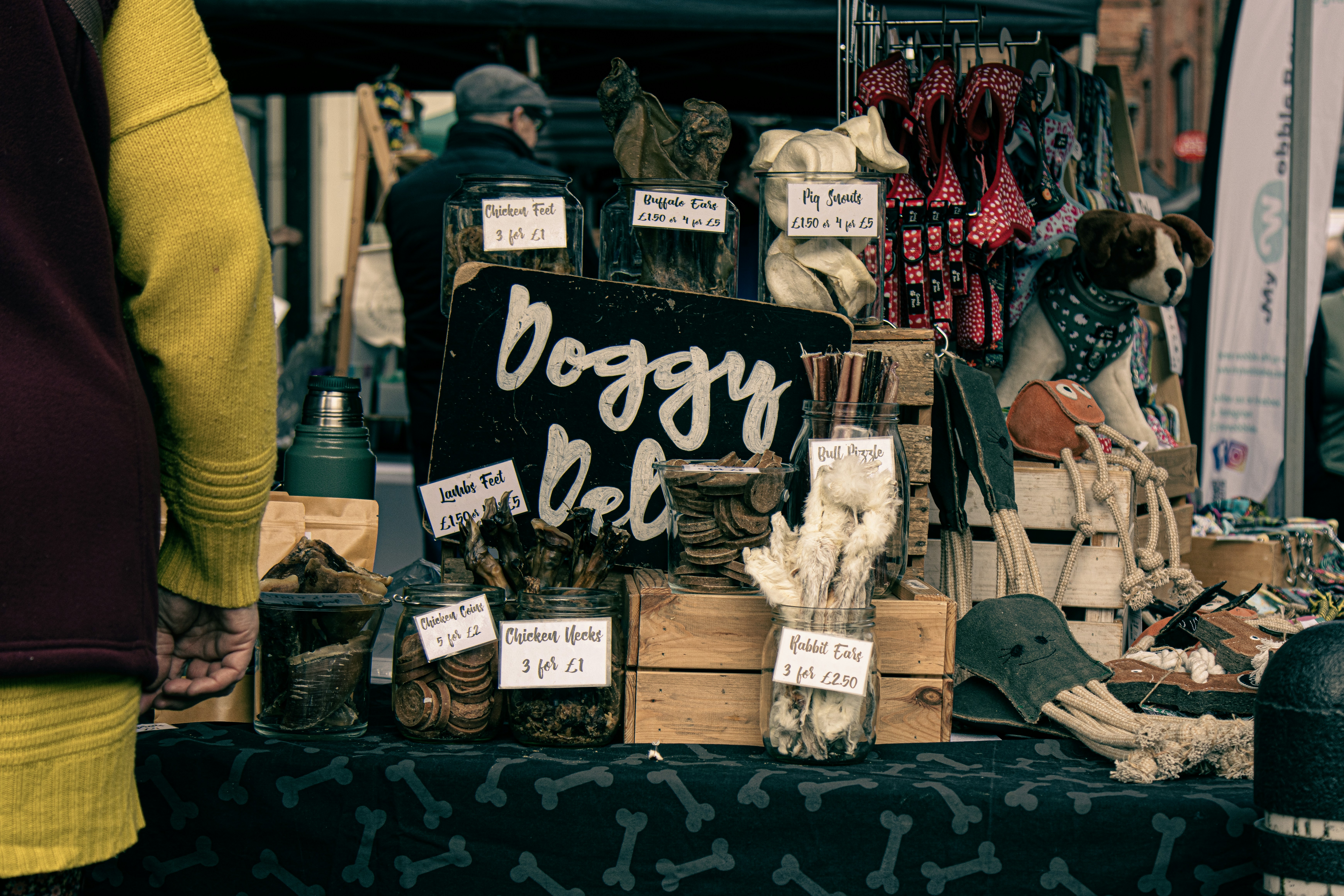 A person standing in front of a display of shoes