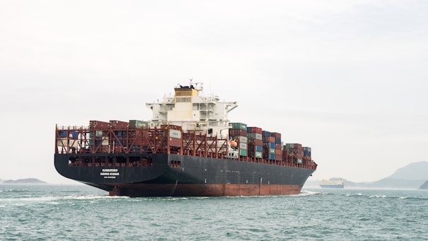 A large cargo ship in the middle of the ocean