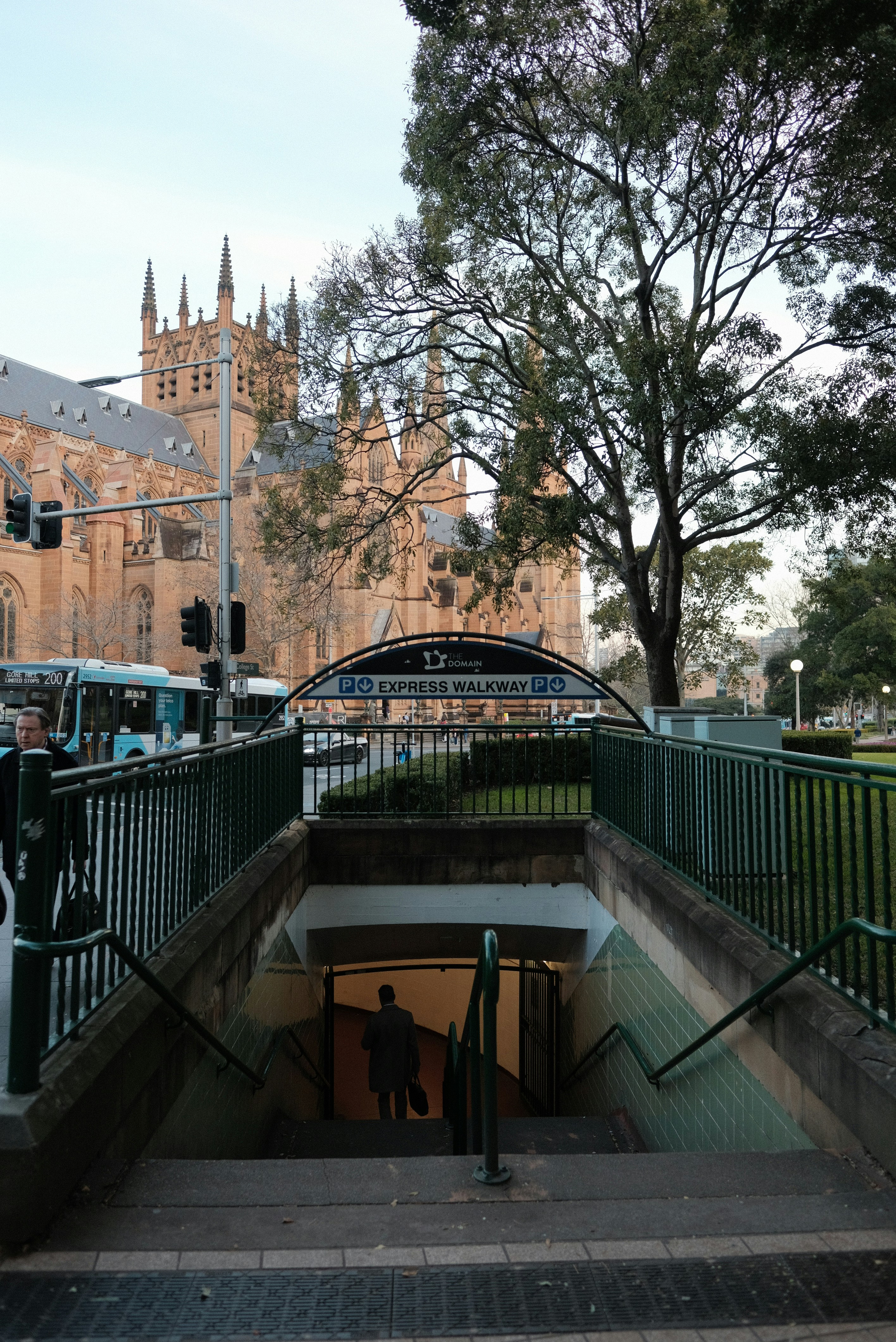 A large cathedral with a clock tower in the background