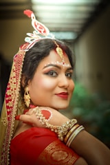 A woman in a red and gold outfit