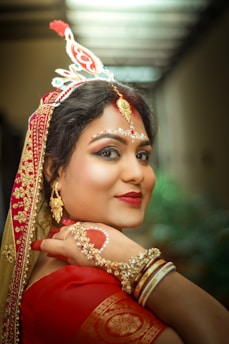 A woman in a red and gold outfit