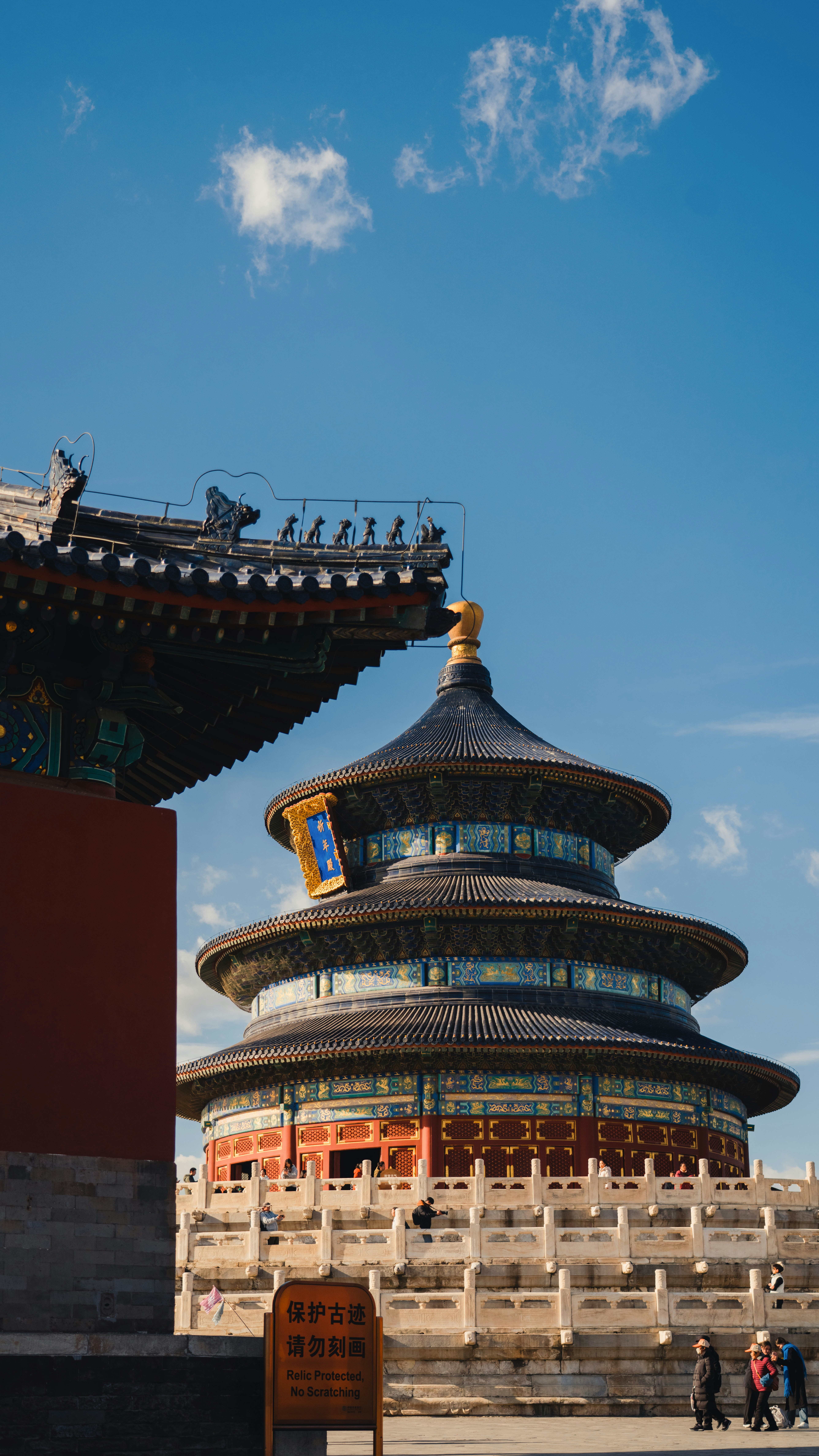 A tall building with a sky in the background