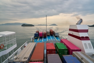 A large boat with lots of containers on it