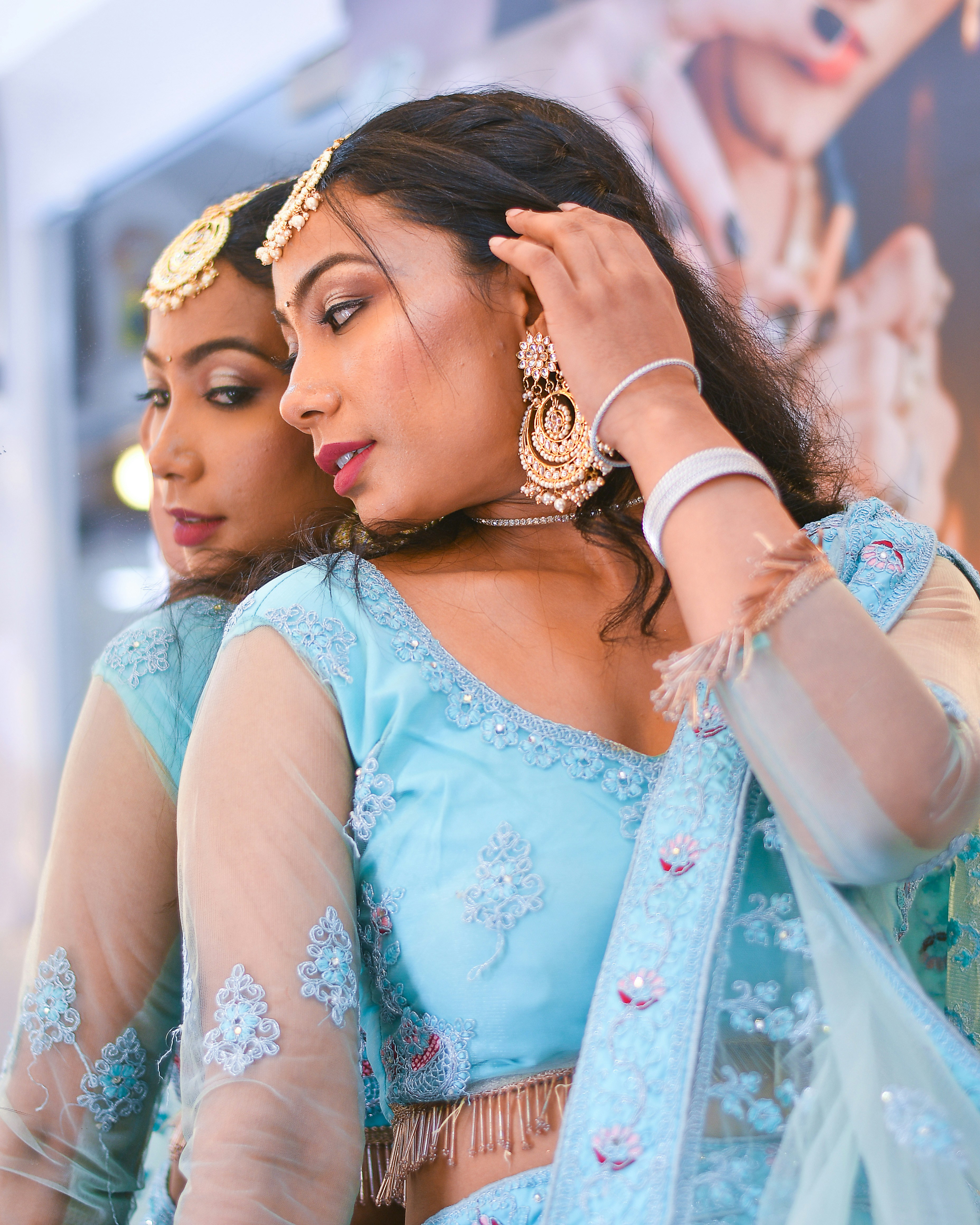 A couple of women standing next to each other
