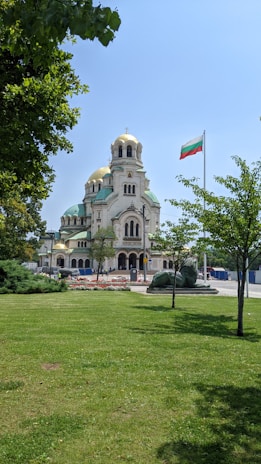 A large building with a flag on top of it