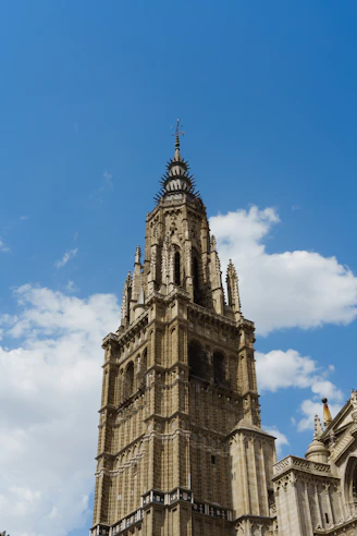A tall tower with a clock on the top of it