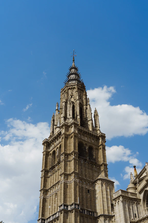 A tall tower with a clock on the top of it