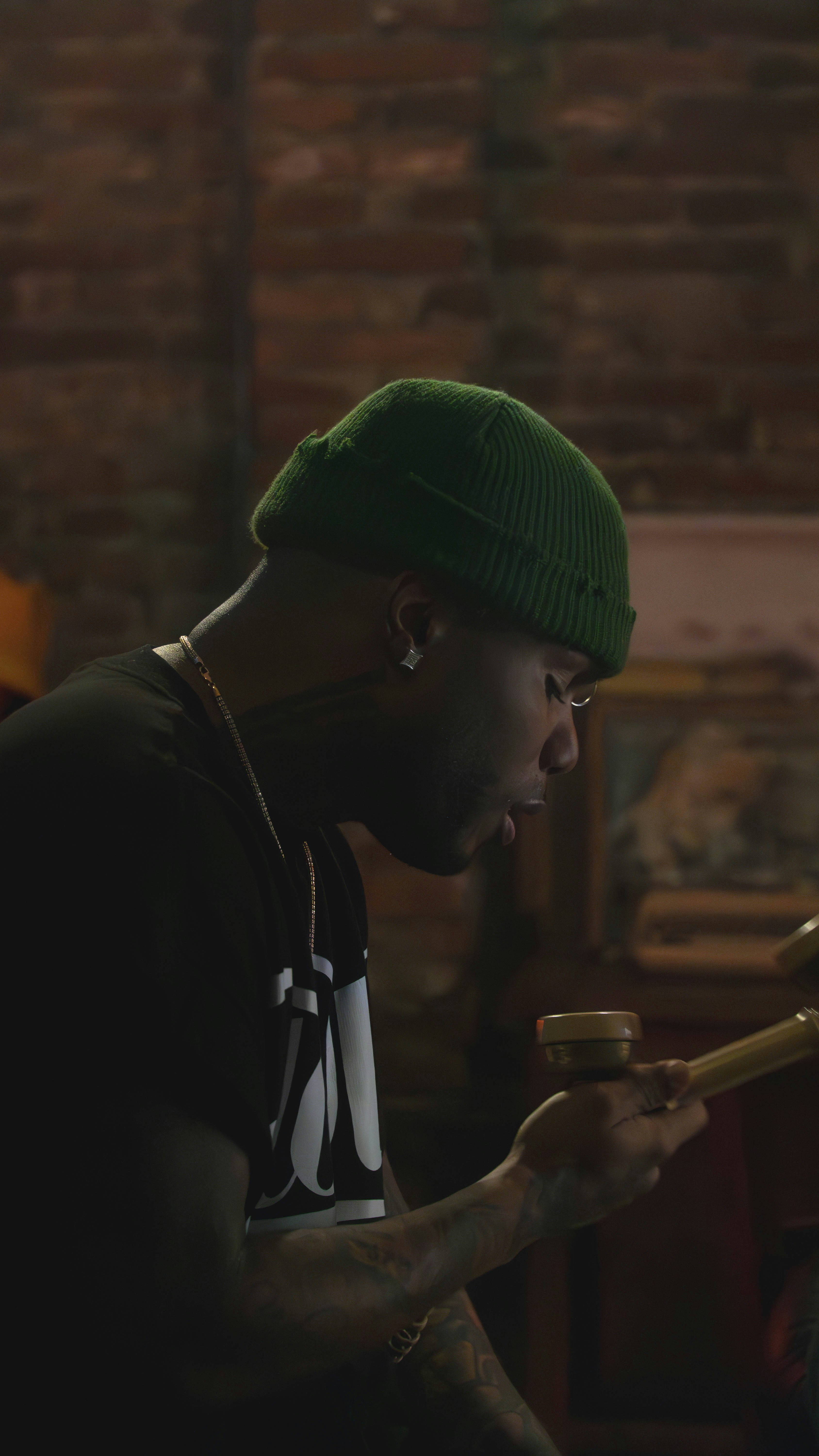 A man with a baseball bat in his hand