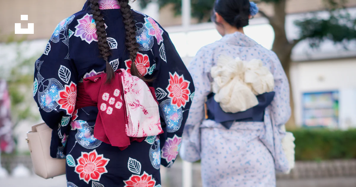Two Women In Kimonos Walking Down The Street Photo Free Woman Image two-women-in-kimonos-walking-down-the-street-photo-free-woman-image