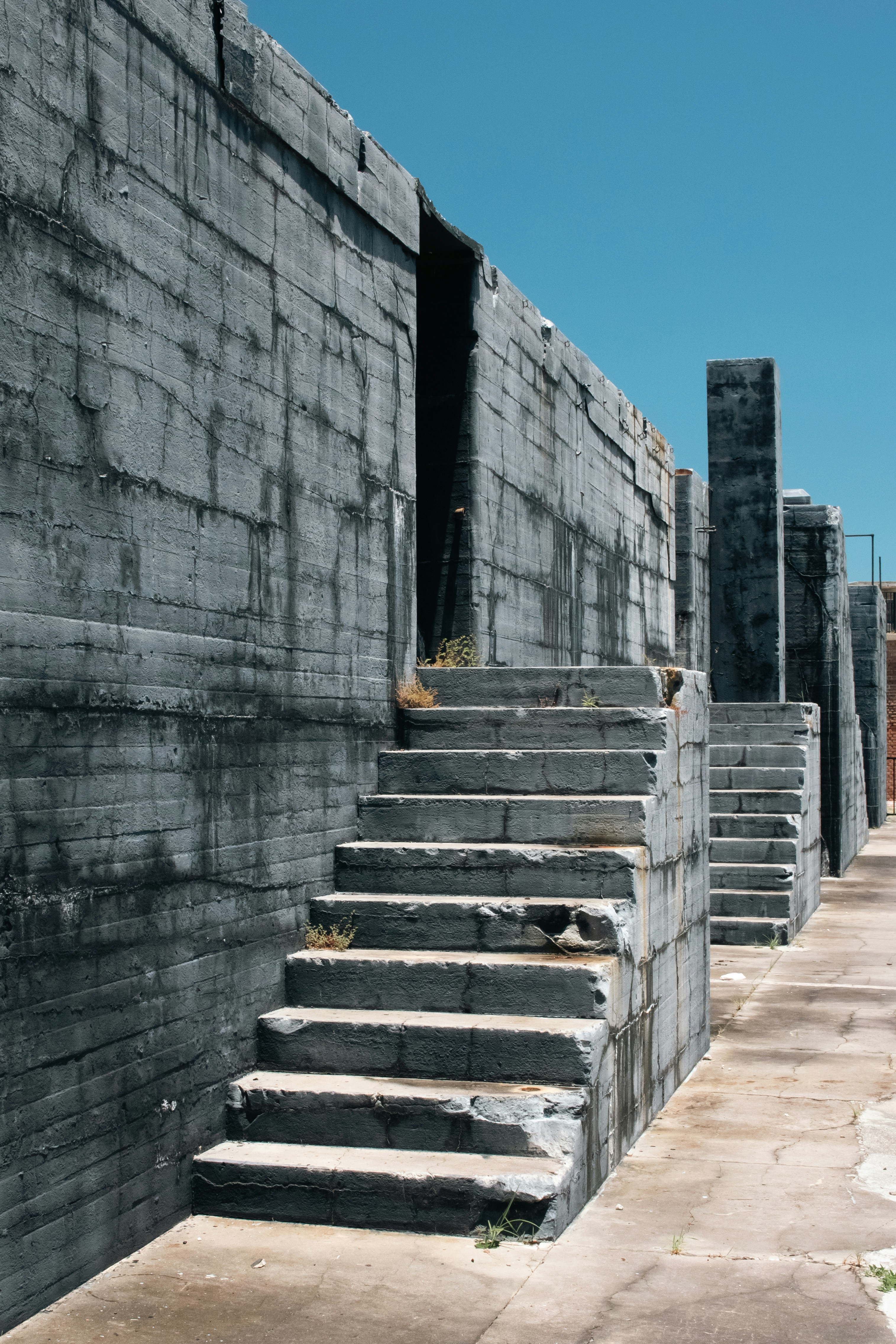A concrete building with steps leading up to it