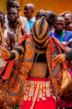 A group of people standing around each other