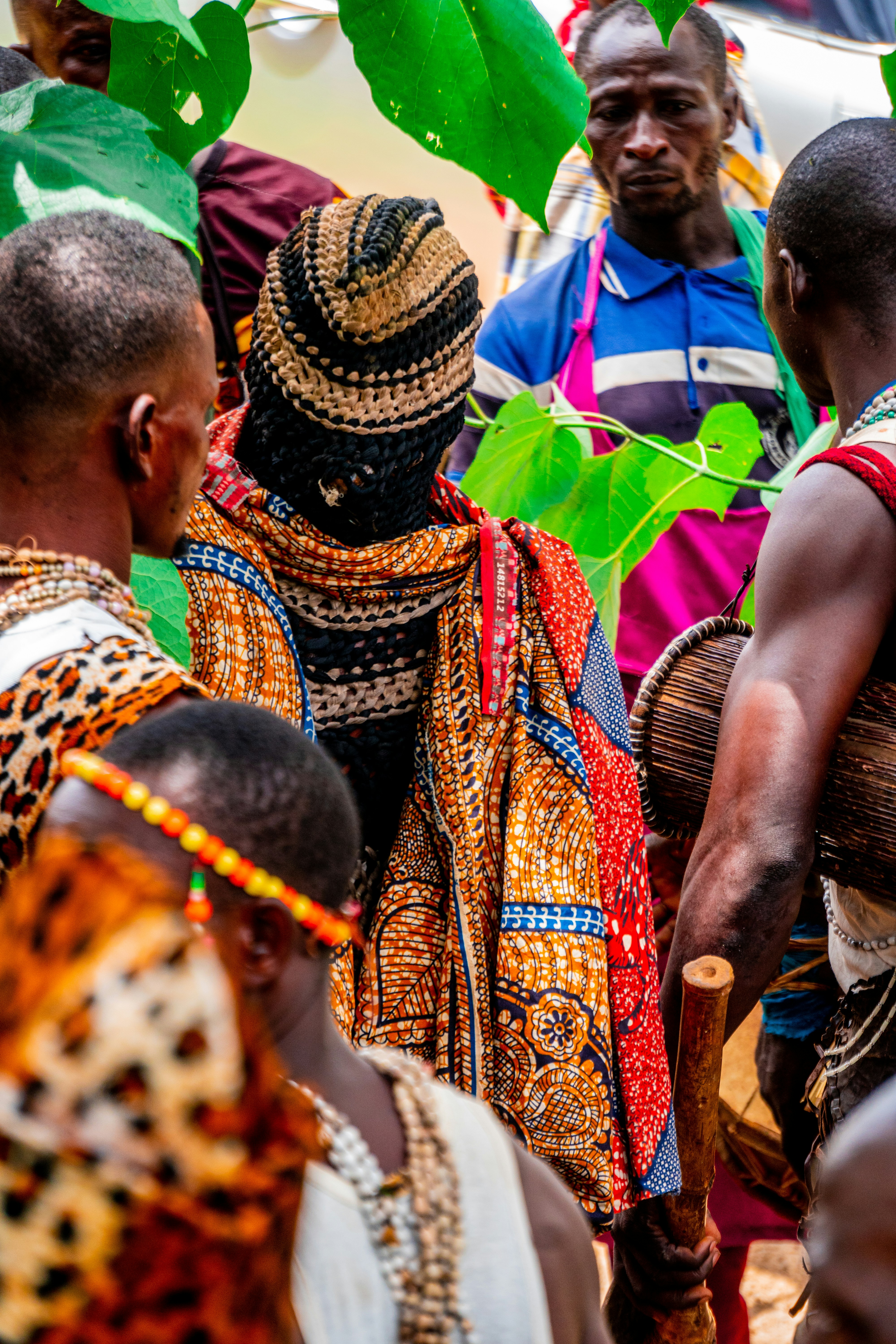 A group of people standing around each other